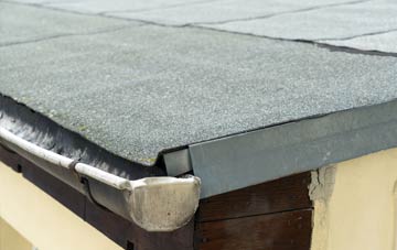 repair or replace Little Canfield flat roofing?
